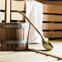Prutz: Hotel Post Wooden bucket and ladle in a sauna with a white towel